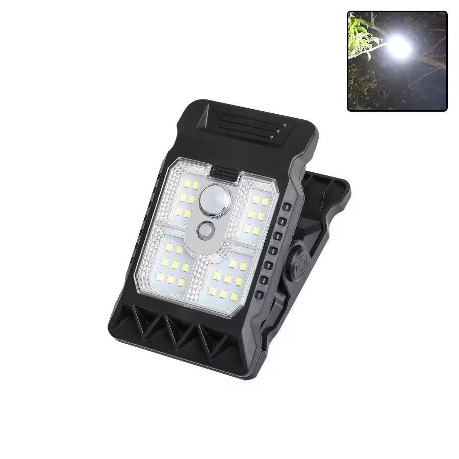 Outdoor solar LED light with clamp