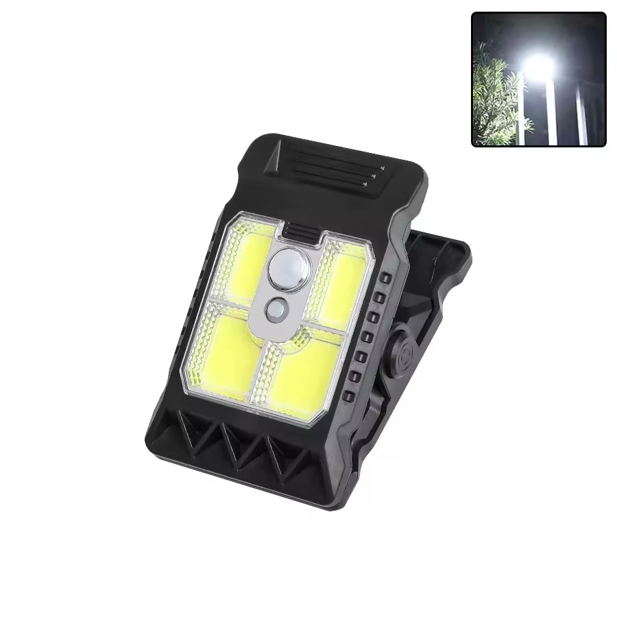 Outdoor solar LED light with clamp