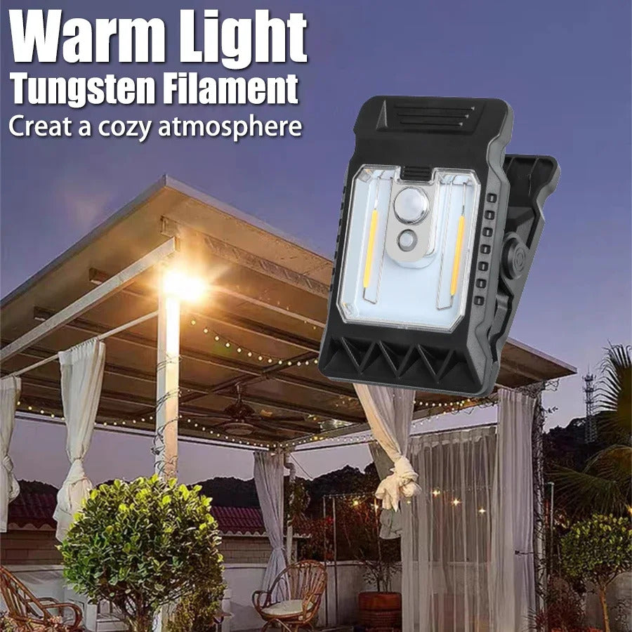 Outdoor solar LED light with clamp